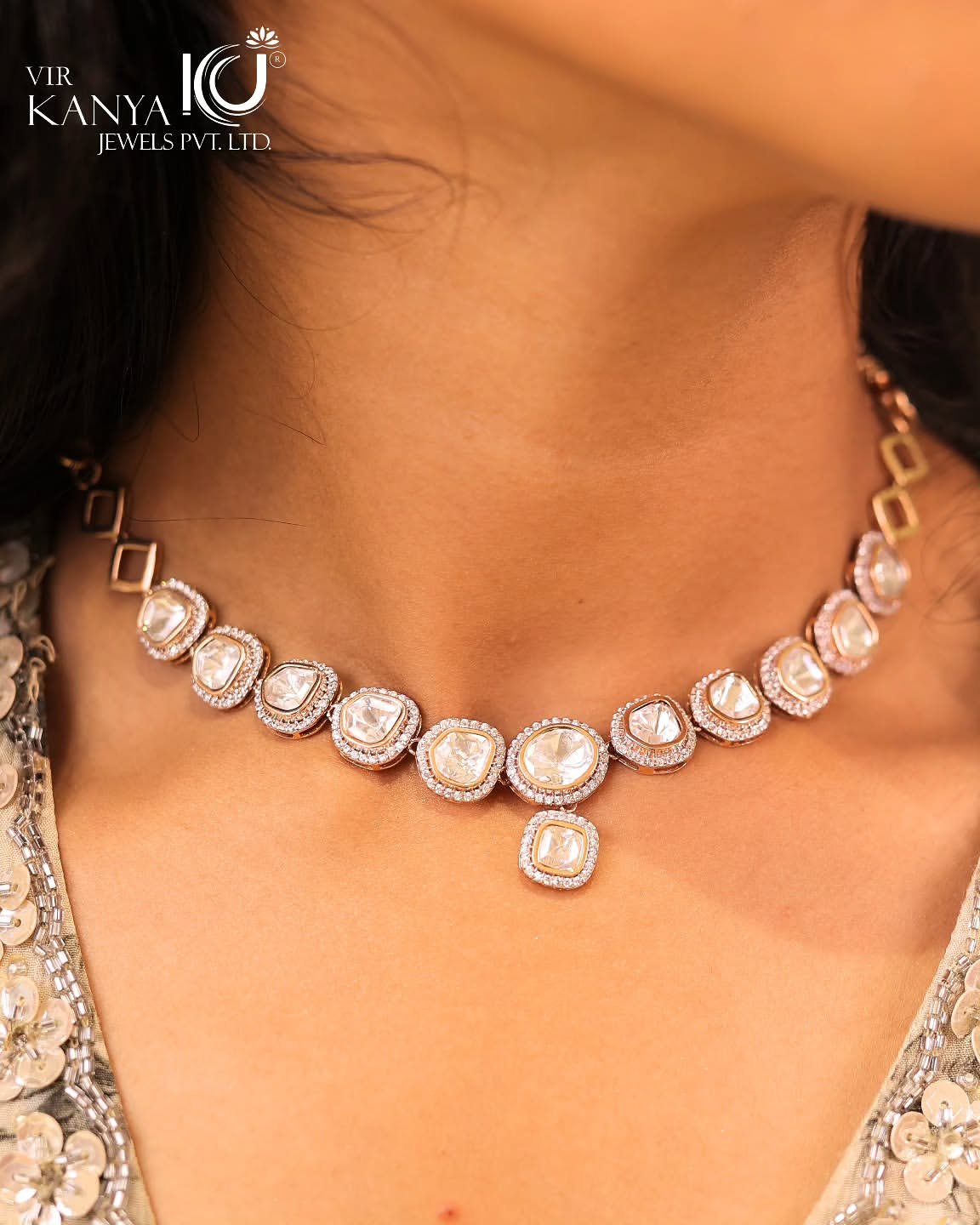 A polki diamond necklace photographed close at the neck